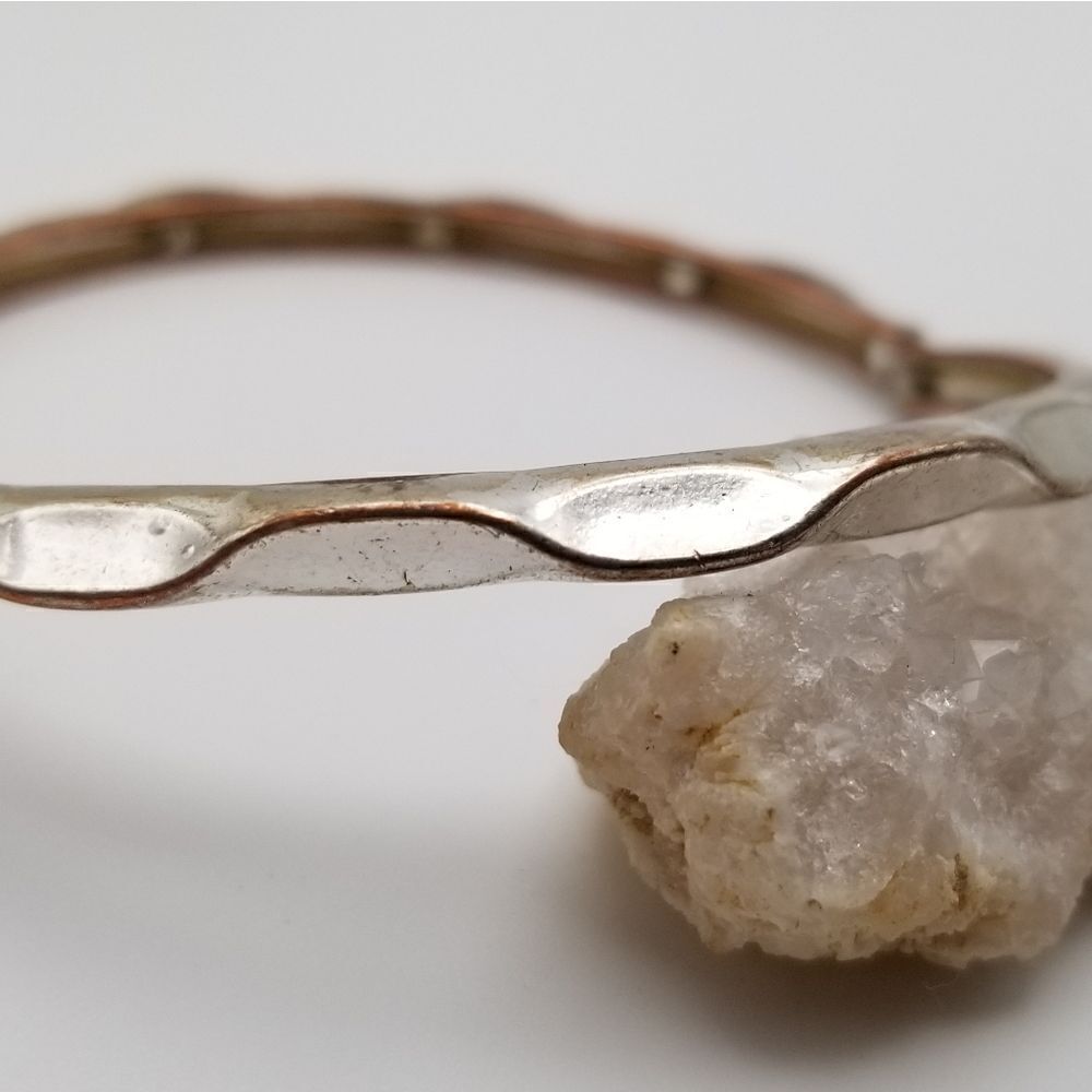 Silver tone concave dot bracelet. B528